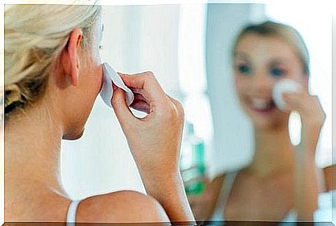 woman cleans face