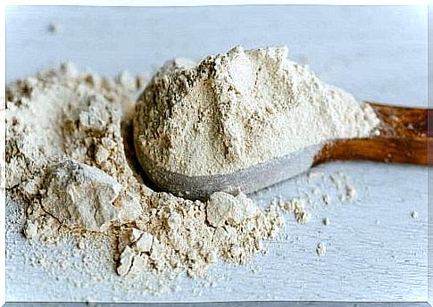 Wooden spoon with maca powder.