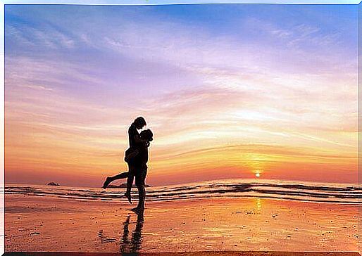 couple on the beach - love at sunset