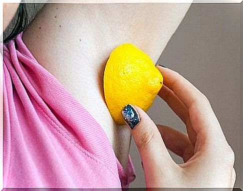 rubbing lemon into the skin of the armpits